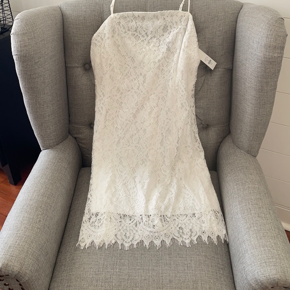 BRAND NEW! Francesca Boutique white lace dress. Great for any occasion!!